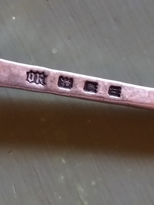 Lot 132 - Omar Ramsden, an Arts and Crafts silver preserve spoon.