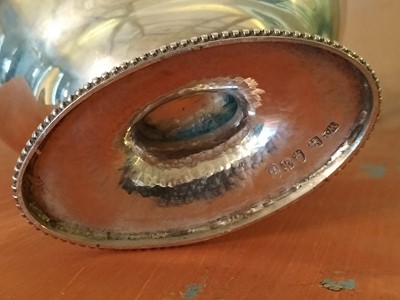 Lot 136 - A George III silver oval swing handled basket.