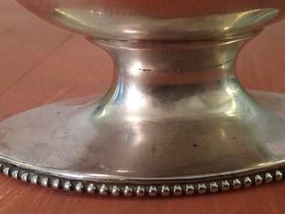 Lot 136 - A George III silver oval swing handled basket.