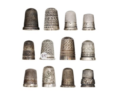 Lot 174 - A collection of twelve silver hallmarked thimbles.