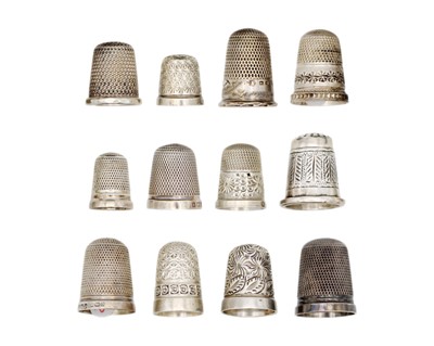 Lot 176 - A collection of twelve silver hallmarked thimbles.