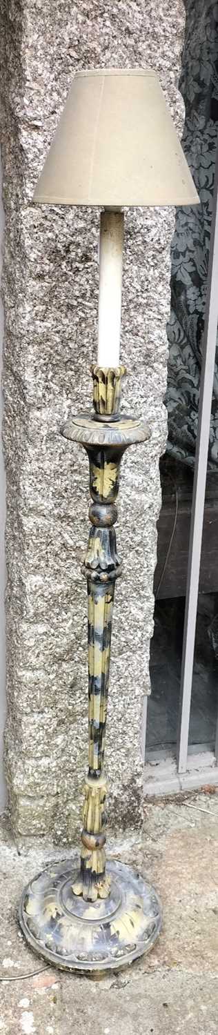 Lot 143 - A mid-sized turned wood standard lamp.