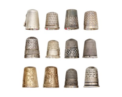 Lot 167 - A collection of twelve silver thimbles.