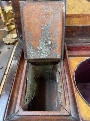 Lot 61 - A Regency exotic wood inlaid sarcophagus shape tea caddy.