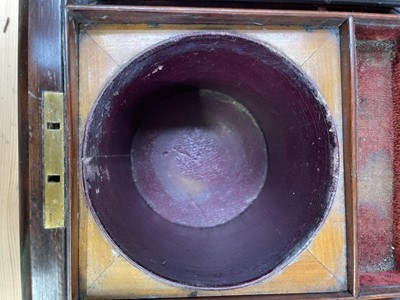 Lot 61 - A Regency exotic wood inlaid sarcophagus shape tea caddy.