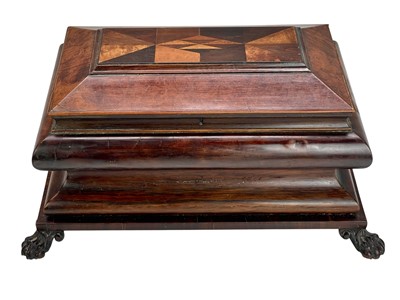 Lot 61 - A Regency exotic wood inlaid sarcophagus shape tea caddy.