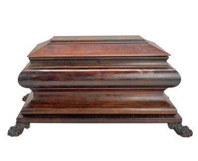 Lot 61 - A Regency exotic wood inlaid sarcophagus shape tea caddy.