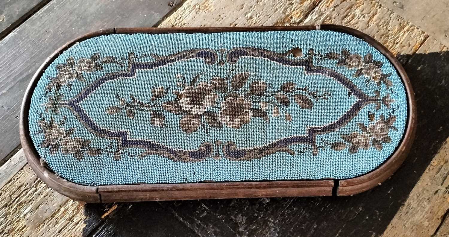 Lot 145 - A Victorian beadwork stand.