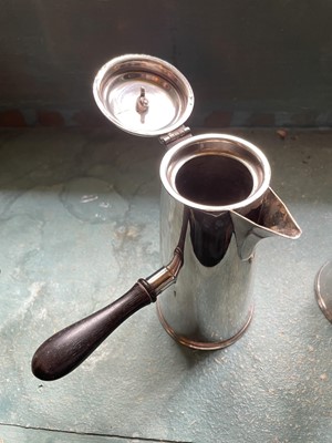 Lot 147 - An early Georgian style silver plated coffee/chocolate pot and hot water jug.