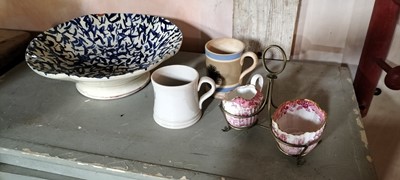Lot 148 - A small mochaware mug.