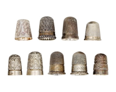 Lot 171 - A collection of nine silver thimbles.