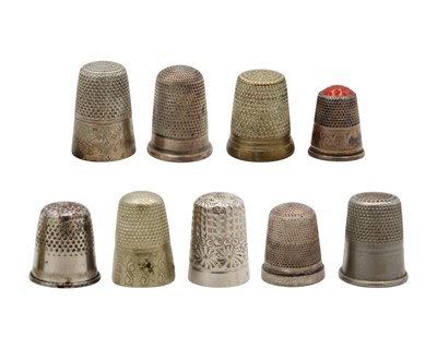 Lot 186 - A selection of five thimble holders.