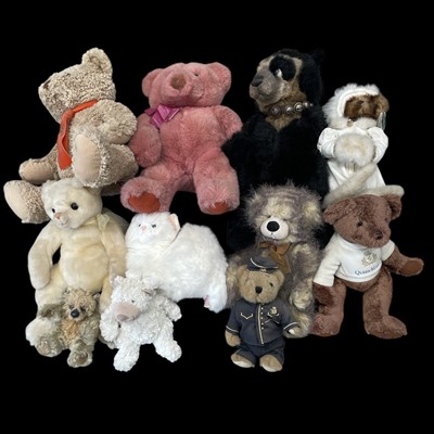 Lot 141 - A selection of soft toys, including Charlie...