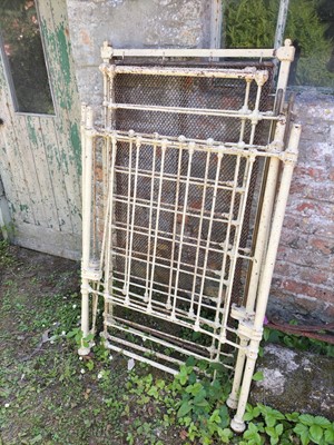 Lot 651 - Iron cot and bed