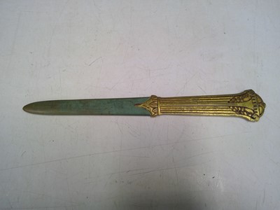 Lot 182 - A Bronze Letter Opener. The piece is signed A....