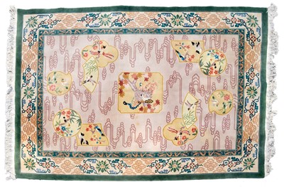 Lot 682 - A Chinese carpet.