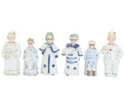 Lot 476 - Three pairs of continental nodding head figures.
