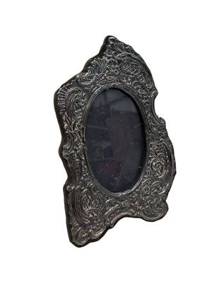 Lot 18 - A silver fronted art nouveau style picture...