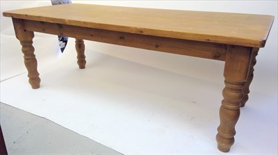 Lot 3488 - A large pine kitchen table, the rectangular...
