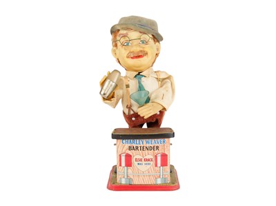 Lot 170 - A Japanese tinplate bar tender toy figure.