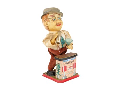 Lot 170 - A Japanese tinplate bar tender toy figure.