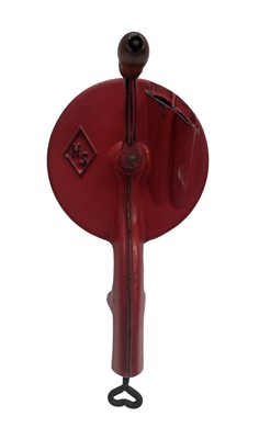Lot 45 - A vintage cast iron bean slicer.