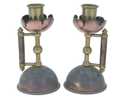 Lot 169 - A pair of Arts and Crafts candlesticks.