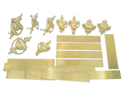 Lot 151 - A collection of brass door knockers.