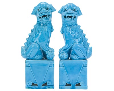 Lot 589 - A pair of turquiose glaze foo dogs.
