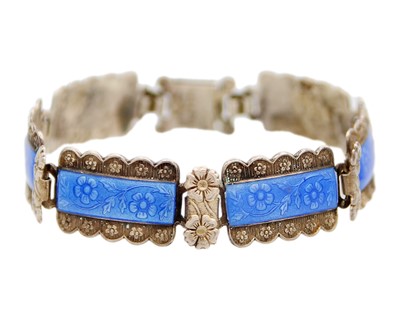 Lot 1 - A mid-20th-century silver and blue enamel floral motif bracelet by 'Harmony'.
