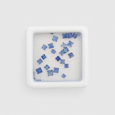 Lot 105 - A parcel of loose square step-cut blue sapphires.