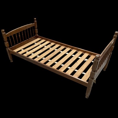 Lot 22 - A Pine Single Bed. The Frame measures 200cm...