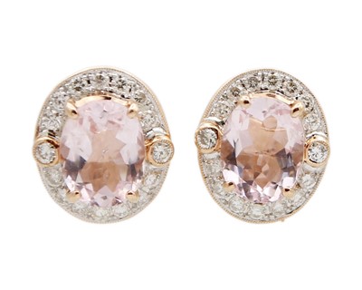 Lot 70 - A pair of 18k rose gold, pink morganite, and diamond halo stud earrings.