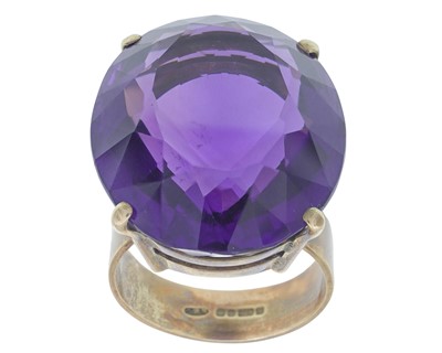 Lot 83 - A 9k gold and amethyst cocktail ring.