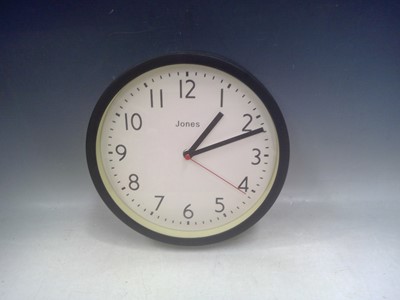 Lot 131 - A 25cm diameter Clock. The Clock is working.