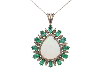 Lot 50 - A large opal, emerald, and diamond pendant set in silver, with a chain.