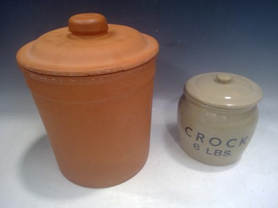 Lot 135 - A Crock Pot and a Terracotta Storage Jar. The...