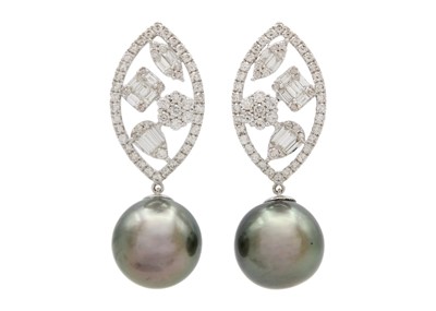 Lot 115 - An unusual pair of 18k white gold, Tahitian pearl, and diamond pendant stud earrings.