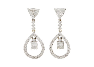 Lot 120 - A pair of 18k white gold, diamond screw-back pendant earrings.