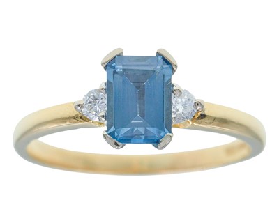 Lot 134 - An 18k gold, Swizz blue topaz, and diamond ring.
