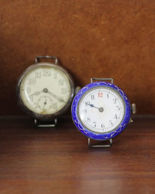Lot 193 - A WWI officers silver trench lug wristwatch and a silver and blue enamel lug wristwatch.