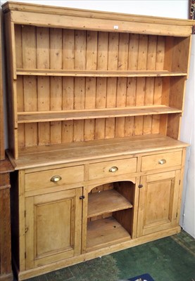 Lot 3521 - A pine dresser, the rack with two shelves, the...