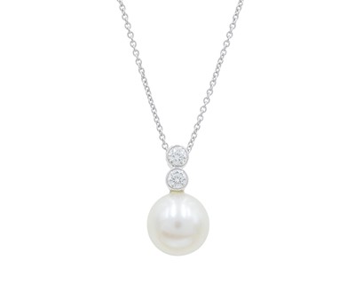 Lot 147 - A 9k white gold, cultured white pearl, and diamond pendant necklace.