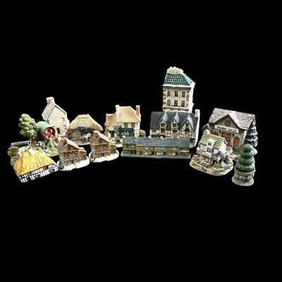 Lot 150 - A collection of miniature cottages, including...