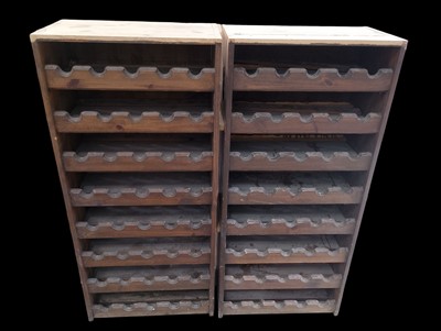 Lot 4 - Two stained pine wine racks, each to hold...
