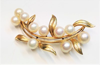 Lot 2632 - A 14ct gold Mikimoto pearl mounted brooch,...