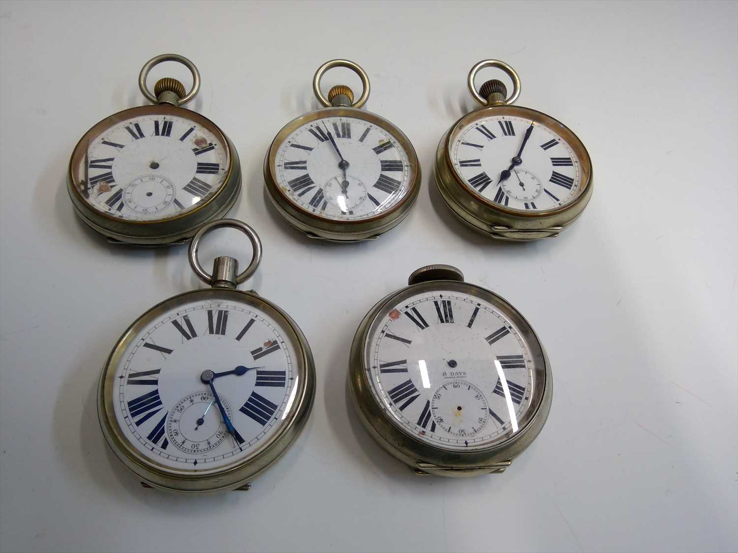 Lot 2633 - Five keyless 8 day goliath pocket watches