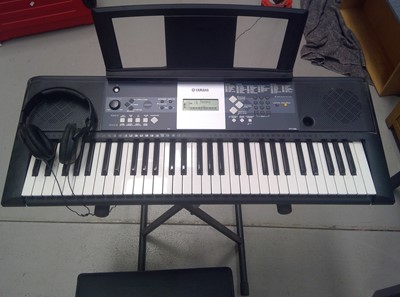 Lot 36 - A Yamaha Keyboard, Stand, Stool and Sennheiser...