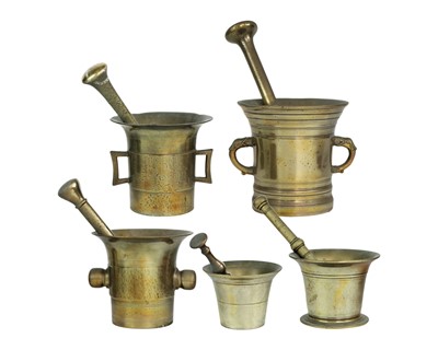 Lot 209 - A collection of brass pestles and mortars.