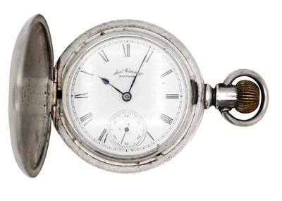 Lot 262 - WALTHAM - A white metal 'COIN' case keyless wind full hunter pocket watch.